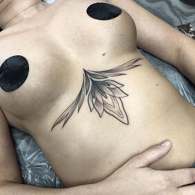 Tattoo Organic and delicate feminine motif underboob motif: floral style: dotwork