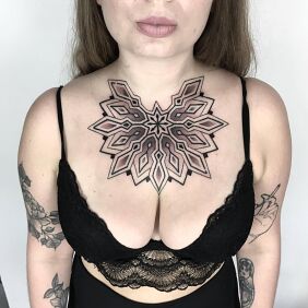 Tattoo Elaborate chest mandala on the chest motif: sexy style: geometric
