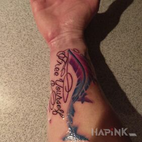 Tattoo Free Yourself on the forearm motif: lettering