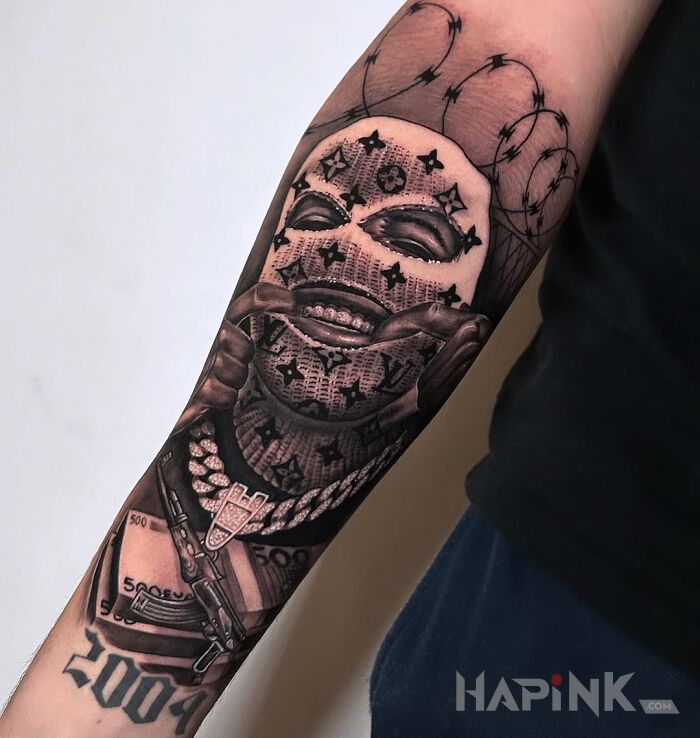 Tattoo Real Gangsta shit in 3D motif and realistic style On the arm