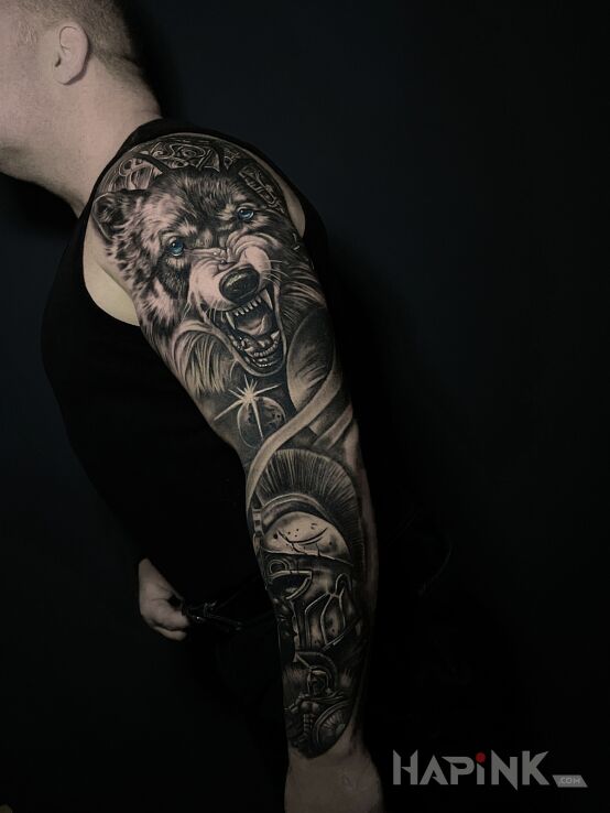 Tattoo Wolfhound and legionnaire on one arm in sleeves motif and realistic style on the upper arm