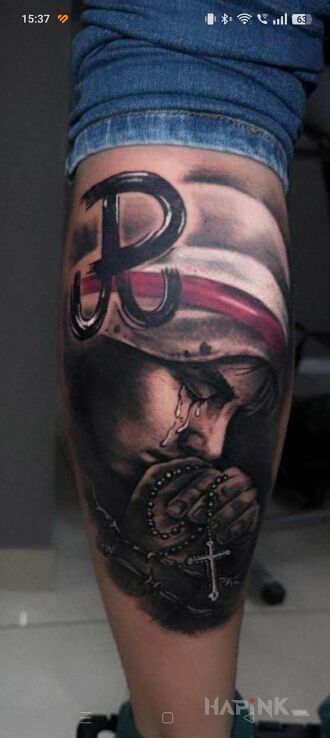 Tattoo Crying Little Insurgent in black and gray motif and realistic style on the leg