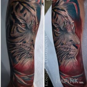 Tattoo Tiger on the forearm motif: colorful style: Watercolor