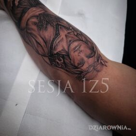 Tatuaż Słowiański bóg Jaryło część 1 na przedramieniu motyw: czarno-szare styl: realistyczne