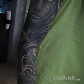 Tattoo Large cover-up on the upper arm motif: black and gray style: blackwork / blackout