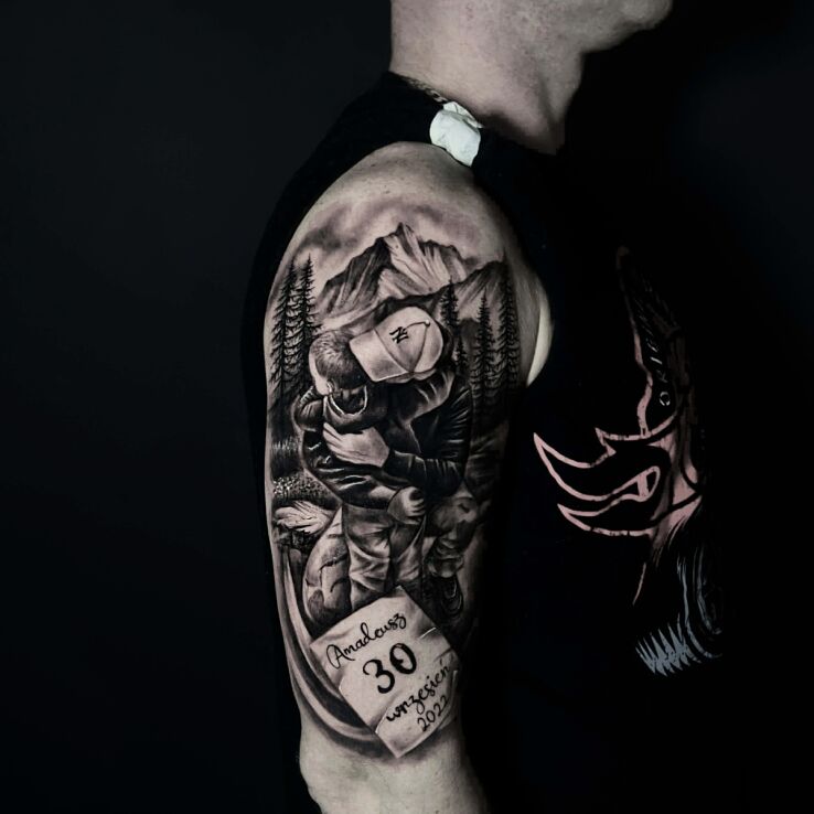 Tattoo Family father and son against the mountains in black and gray motif and realistic style On the arm