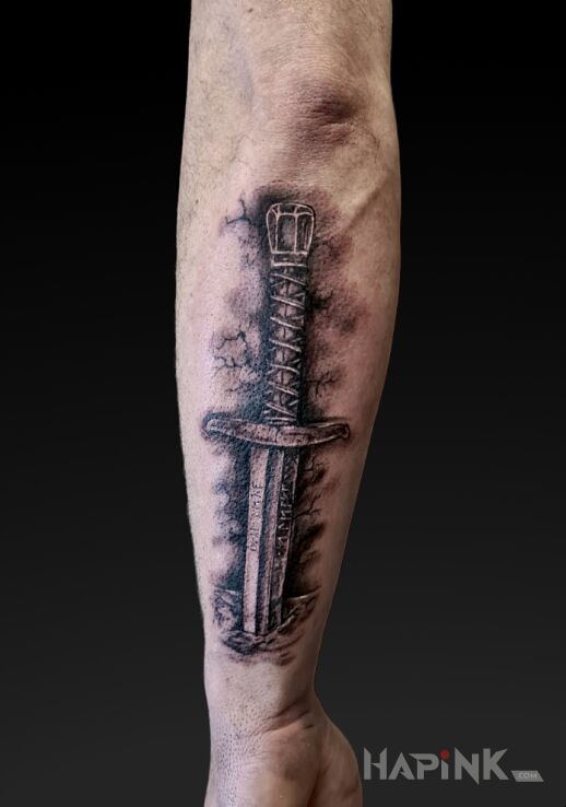 Tattoo Pierced Sword in fantasy motif and realistic style On the arm