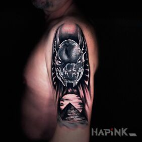 Tattoo Anubis on the upper arm motif: fantasy style: realistic