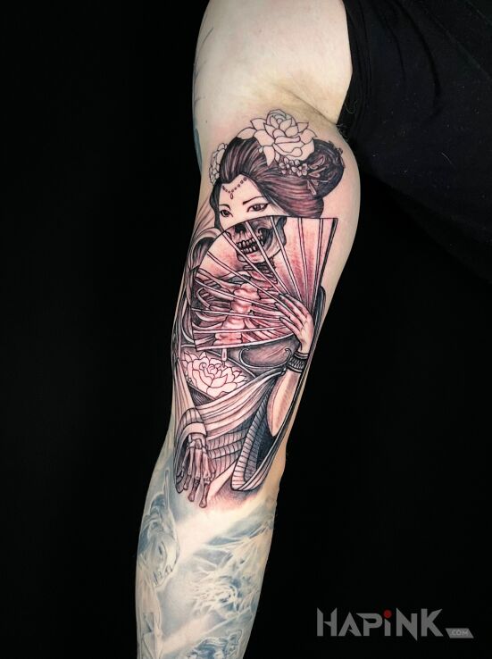 Tattoo Geisha with a Fan in characters motif and graphic / illustrative style on the forearm