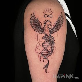 Tattoo Graphic Phoenix on the upper arm motif: fantasy style: graphic / illustrative