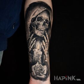 Tattoo Grim Reaper over a burning candle on the forearm motif: flowers style: realistic