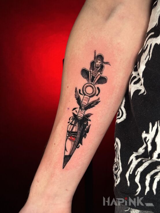 Tattoo Anime in manga / anime motif and graphic / illustrative style on the forearm
