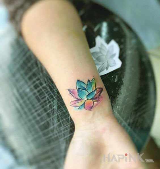 Tattoo Lilia in flowers motif and Watercolor style on the wrist