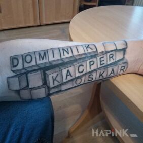 Tattoo My kids on the forearm motif: lettering
