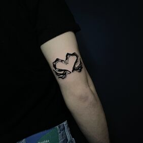 Tattoo Swan Heart On the arm style: abstract