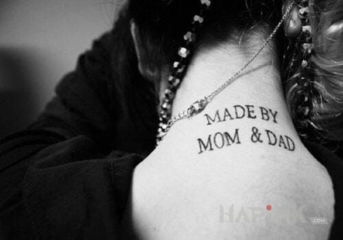 Tattoo MOM and DAD in lettering motif on the nape