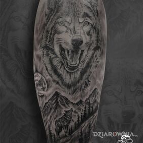 Tatuaż Wilk jako symbol niezależności i dzikiej natury 🐺 na ręce motyw: zwierzęta styl: realistyczne