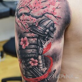 Tattoo Japanese warrior in cherry blossom setting on the upper arm motif: flowers style: realistic
