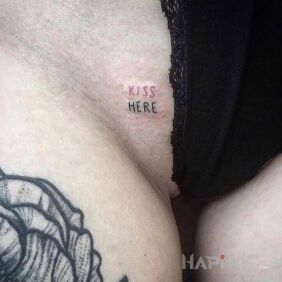 Tattoo Kiss Me intimate motif: lettering style: minimalistic