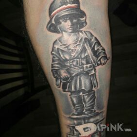 Tattoo Little insurgent on the forearm motif: patriotic