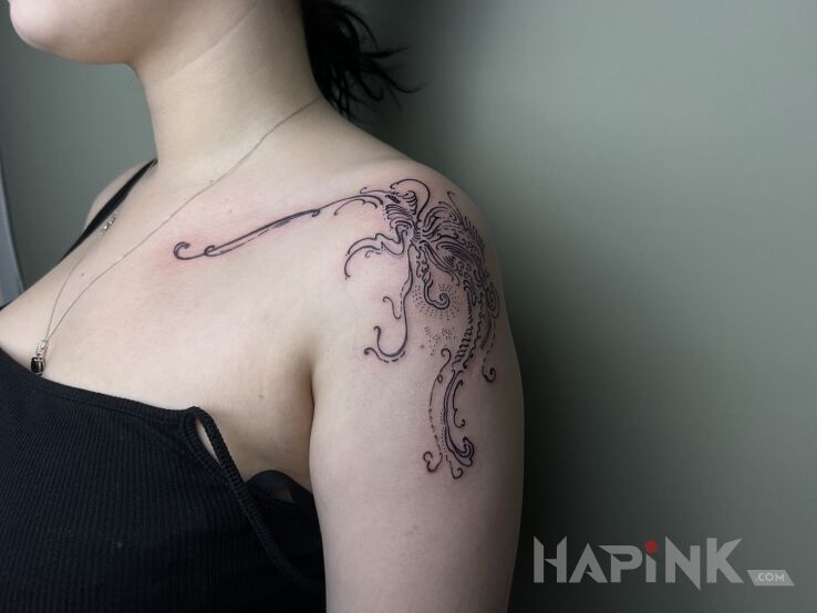 Tattoo Cybersigilism in black and gray motif and abstract style on the shoulder