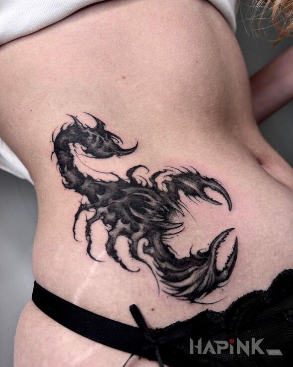 Tattoo Dark Scorpio in animals motif and blackwork / blackout style on the stomach