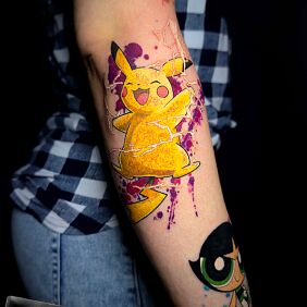 Tattoo Pikachu in color On the arm motif: characters style: graphic / illustrative