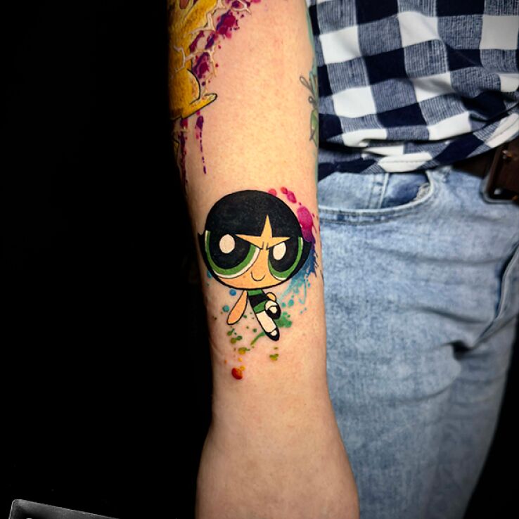 Tattoo Zielona atomówka in colorful motif and cartoon / comic book style On the arm