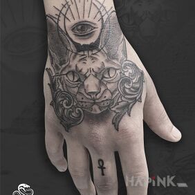 Tattoo Egyptian Sphinx Cat on the hand motif: animals style: graphic / illustrative
