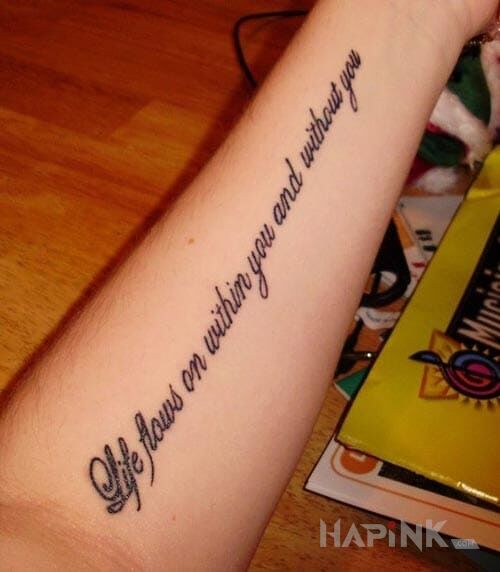 Tattoo Sentencja po angielsku in lettering motif on the forearm