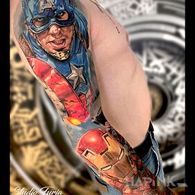 Tattoo Captain America and Iron Man On the arm motif: science fiction style: realistic