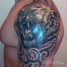 Tattoo Tiger on the upper arm motif: animals