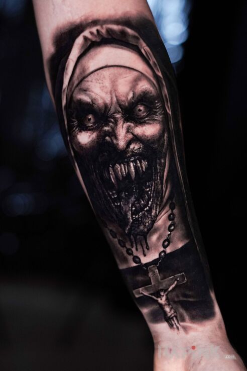 Tattoo Horror Nun in dark motif and realistic style on the forearm