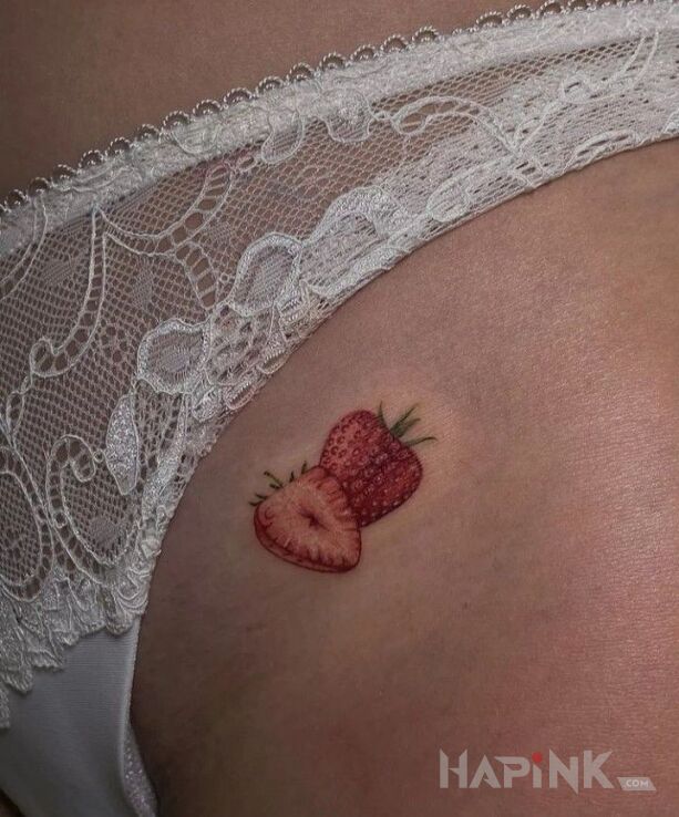 Tattoo Split Strawberry in colorful motif and realistic style intimate