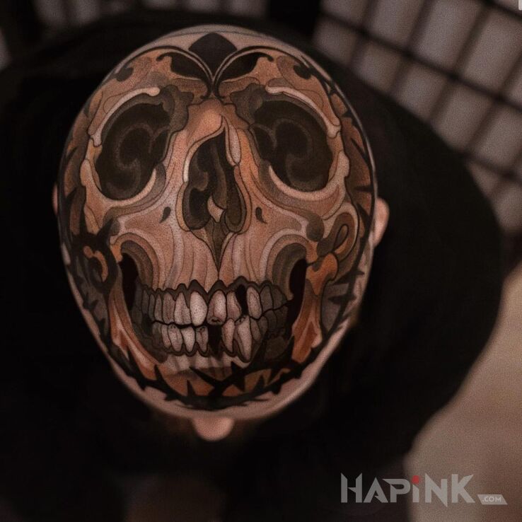 Tattoo Head on a ball not Armani in skulls motif and neo-traditional style on the head