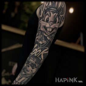 Tattoo Full sleeve in oldschool cartoon style on the shoulder motif: sleeves style: graffiti