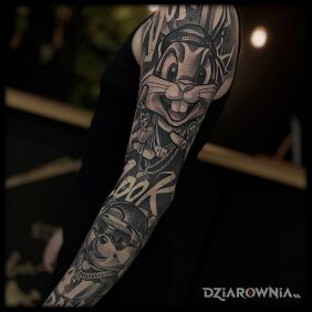 Tatuaż Full sleeve w klimacie oldschool cartoon na ramieniu motyw: rękawy styl: graffiti