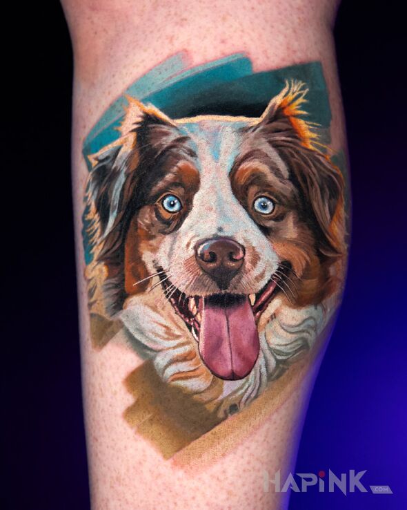 Tattoo Portrait of an Australian Shepherd in animals motif and realistic style on the calf