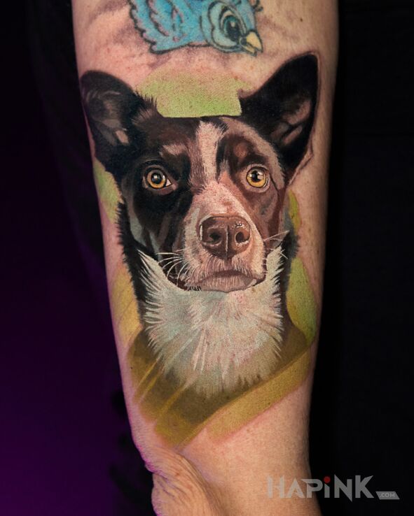 Tattoo Dog Portrait in animals motif and realistic style On the arm