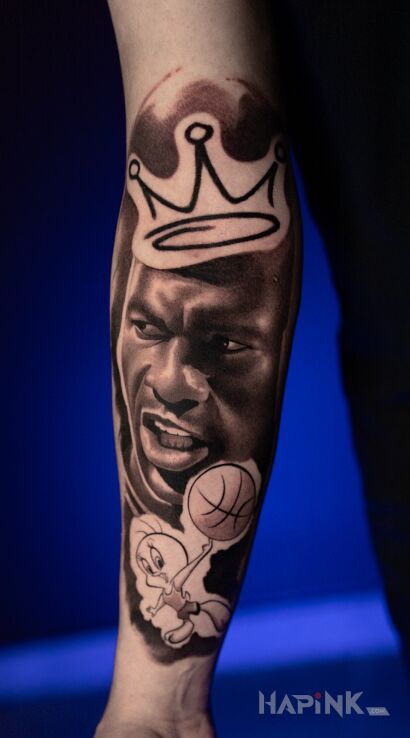 Tattoo Michael Jordan and the Cosmic Match in funny motif and cartoon / comic book style on the forearm
