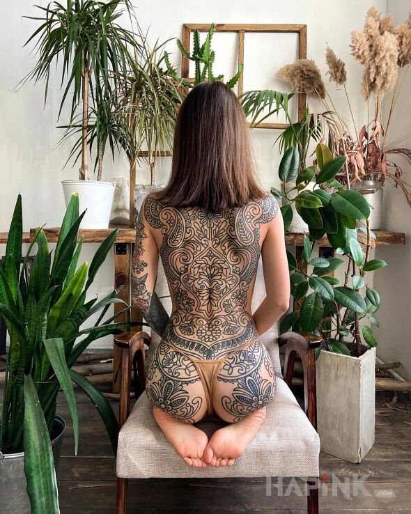 Tattoo Beautiful large composition covering the whole back with outlines only in flowers motif and contour / linework style on the back