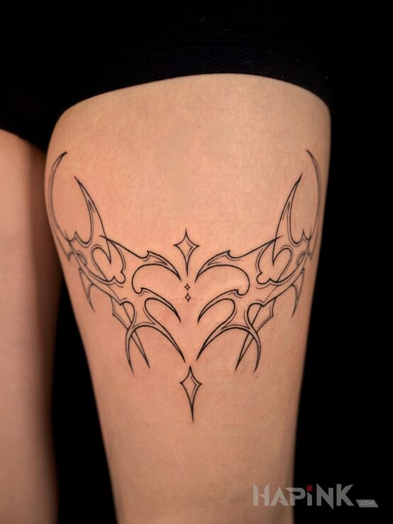 Tattoo Modern tribal in other motif on the thigh