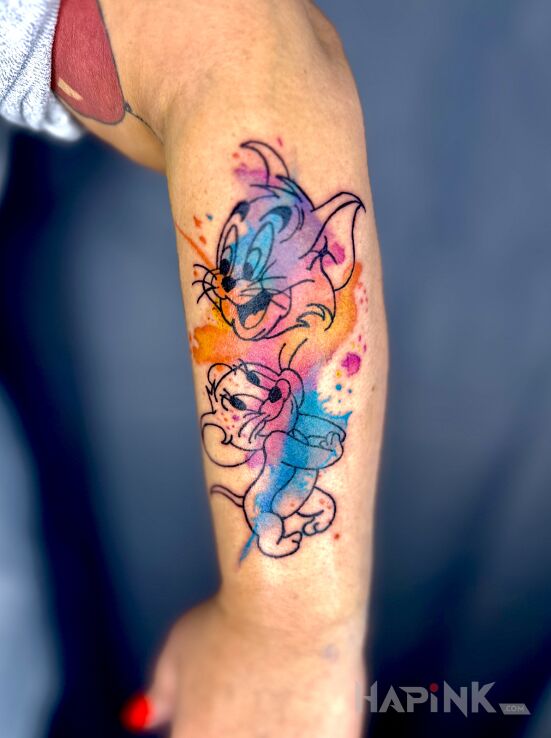 Tattoo Tom and Jerry watercolor in characters motif and cartoon / comic book style on the forearm