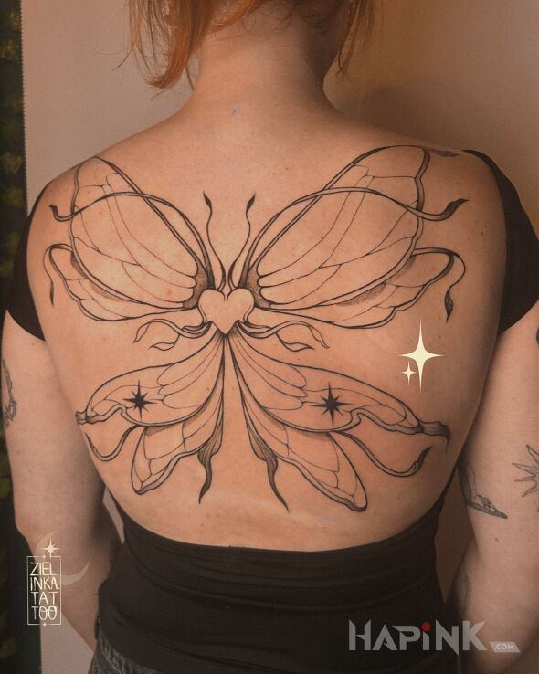 Tattoo Magical Wings in wings motif and contour / linework style on the back