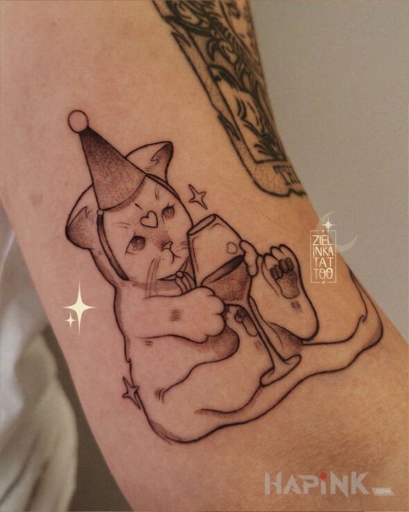 Tattoo Birthday Kitty in animals motif and contour / linework style On the arm