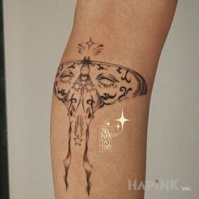 Tattoo Magical Moth on the leg motif: black and gray style: surrealistic