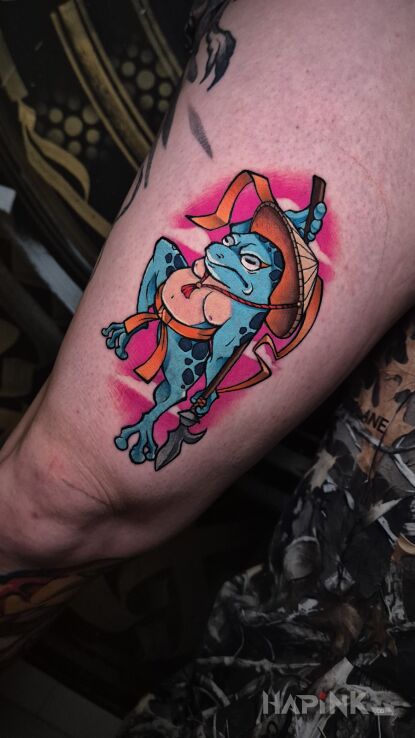 Tattoo Samurai frog in Japanese style in colorful motif and neo-traditional style on the thigh