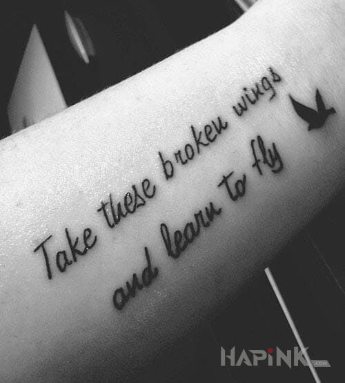 Tattoo Nauka latania in lettering motif on the forearm