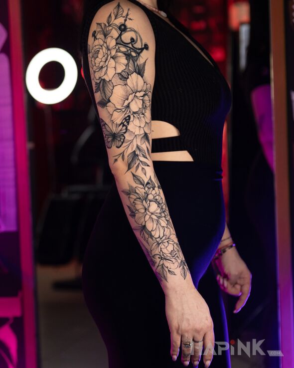 Tattoo Finished feminine sleeve, peonies and butterfly in delicate dotwork 🌸 in insects motif and contour / linework style on the upper arm