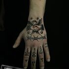 Traditional composition on hand and fingers